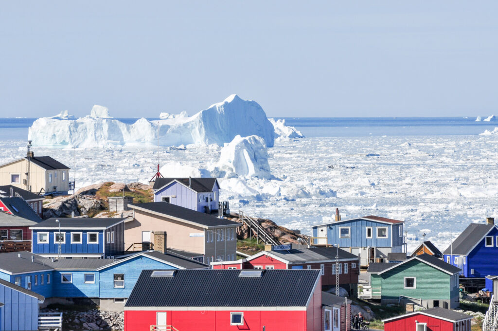 best places to visit in the Arctic Ilulissat town in Greenland with icebergs