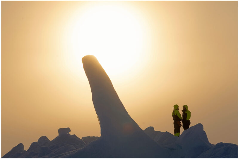 two expedition guides near the North Pole