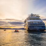 Small ship luxury expedition cruise in the Northwest Passage sunset. Silver Cloud