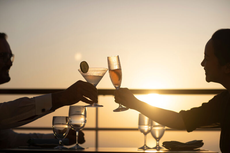 enjoying a drink at sea