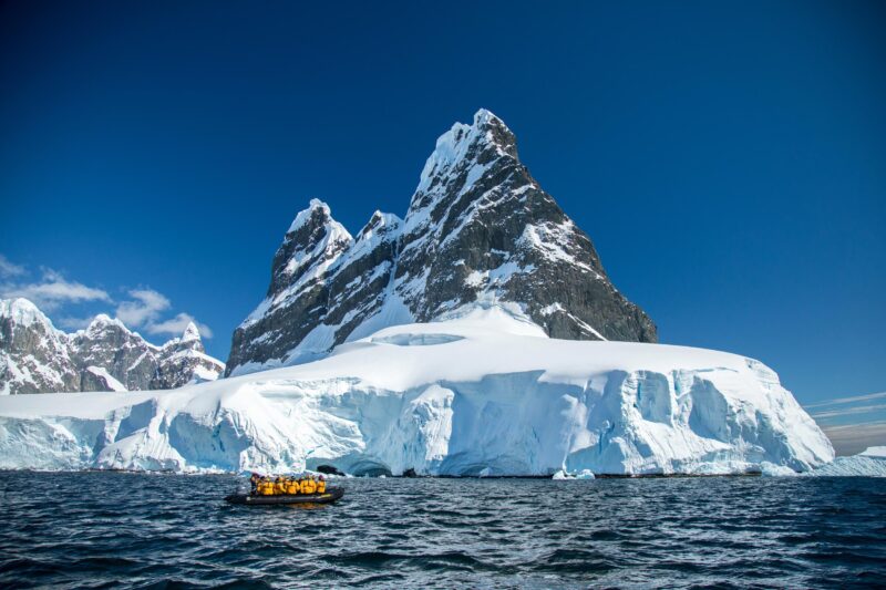 exploring the Antarctic Peninsula on a Zodiac by expedition cruise