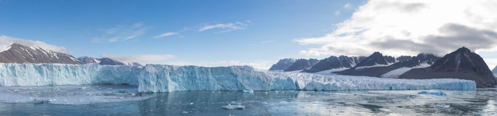 monaco glacier in svalbard showing entire glacier face
